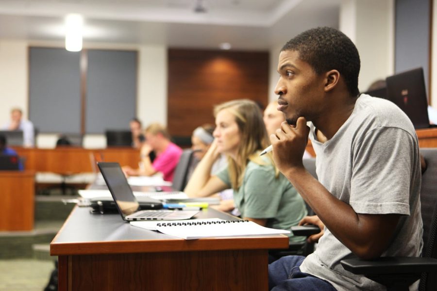 Students in a Hough Graduate School of Business classroom