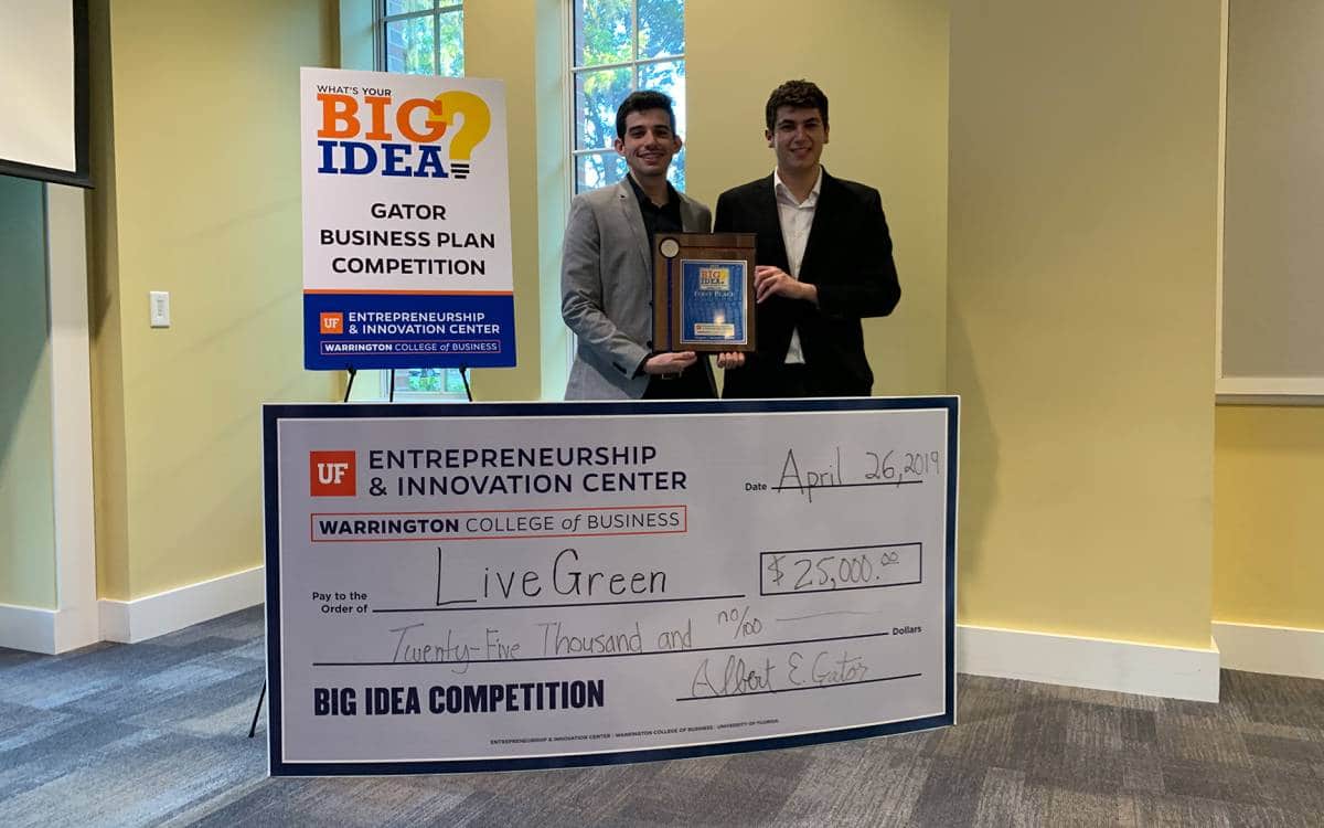 Pablo Garces and Brian De Souza with their first place $25,000 check at the 2019 Big Idea Competition.