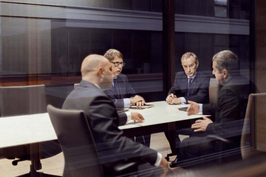 Executive businessmen talking in a meeting room