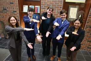 Winning team does the Gator Chomp.