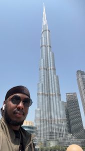 Allan Kaboyo with a skyscraper.