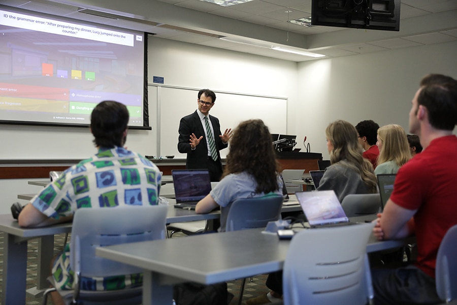 A professor explains a new concept to a classroom of 3/2 accounting students enrolled in the University of Florida Warrington College of Business