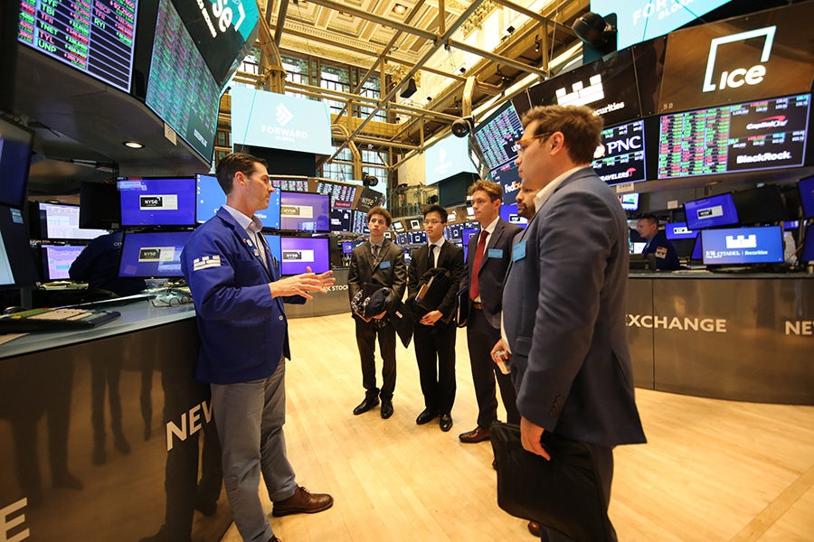 Students enrolled in the University of Florida Warrington College of Business' combination finance degree program prepare to tour the New York Stock Exchange