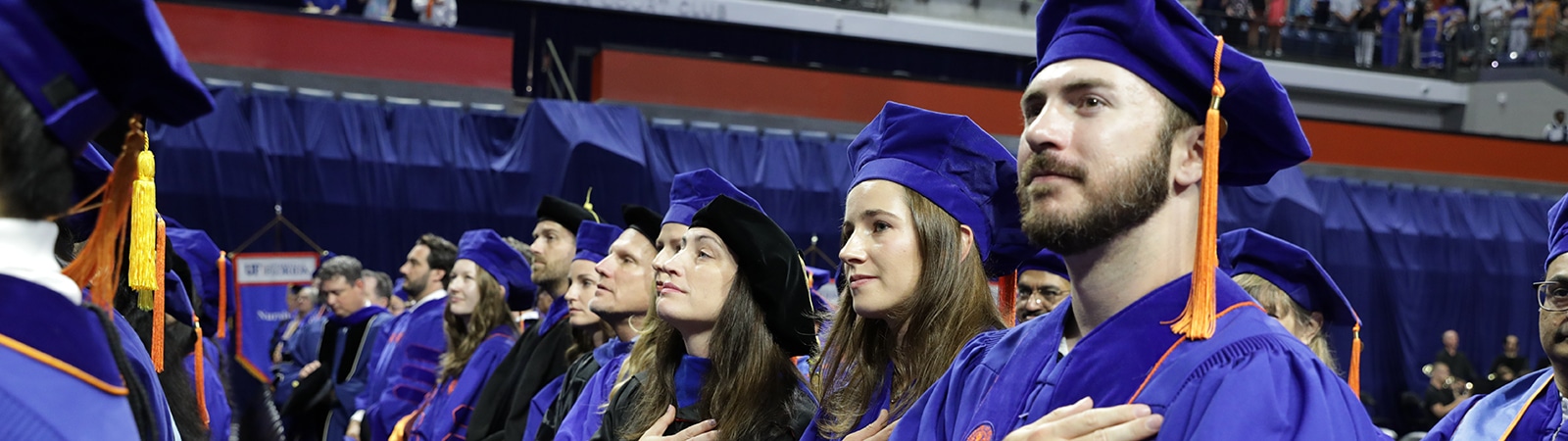A row of DBA students during the University of Florida commencement ceremony