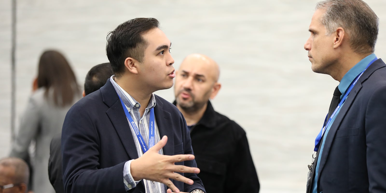 Two faculty members from a University of Florida Warrington College of Business research center engage in a discussion