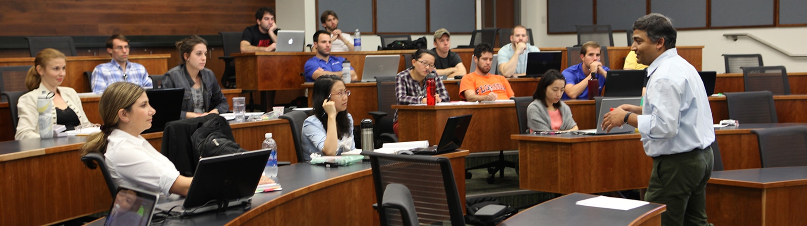 A faculty member speaks to a class of students enrolled in one of the University of Florida Warrington College of Business' joint degree programs
