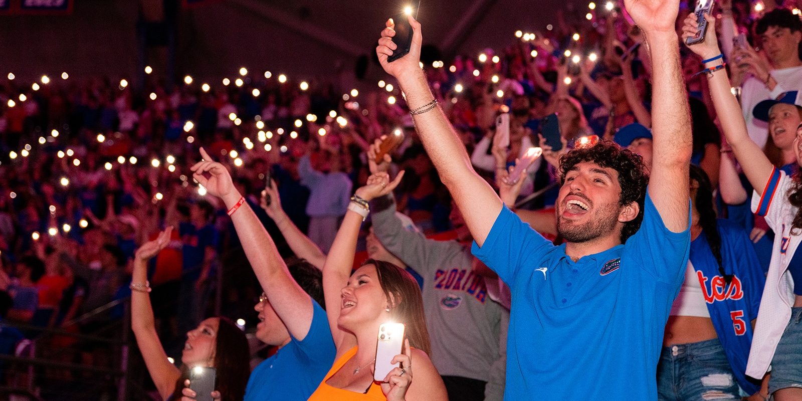 Students celebrating at a sporting event. 