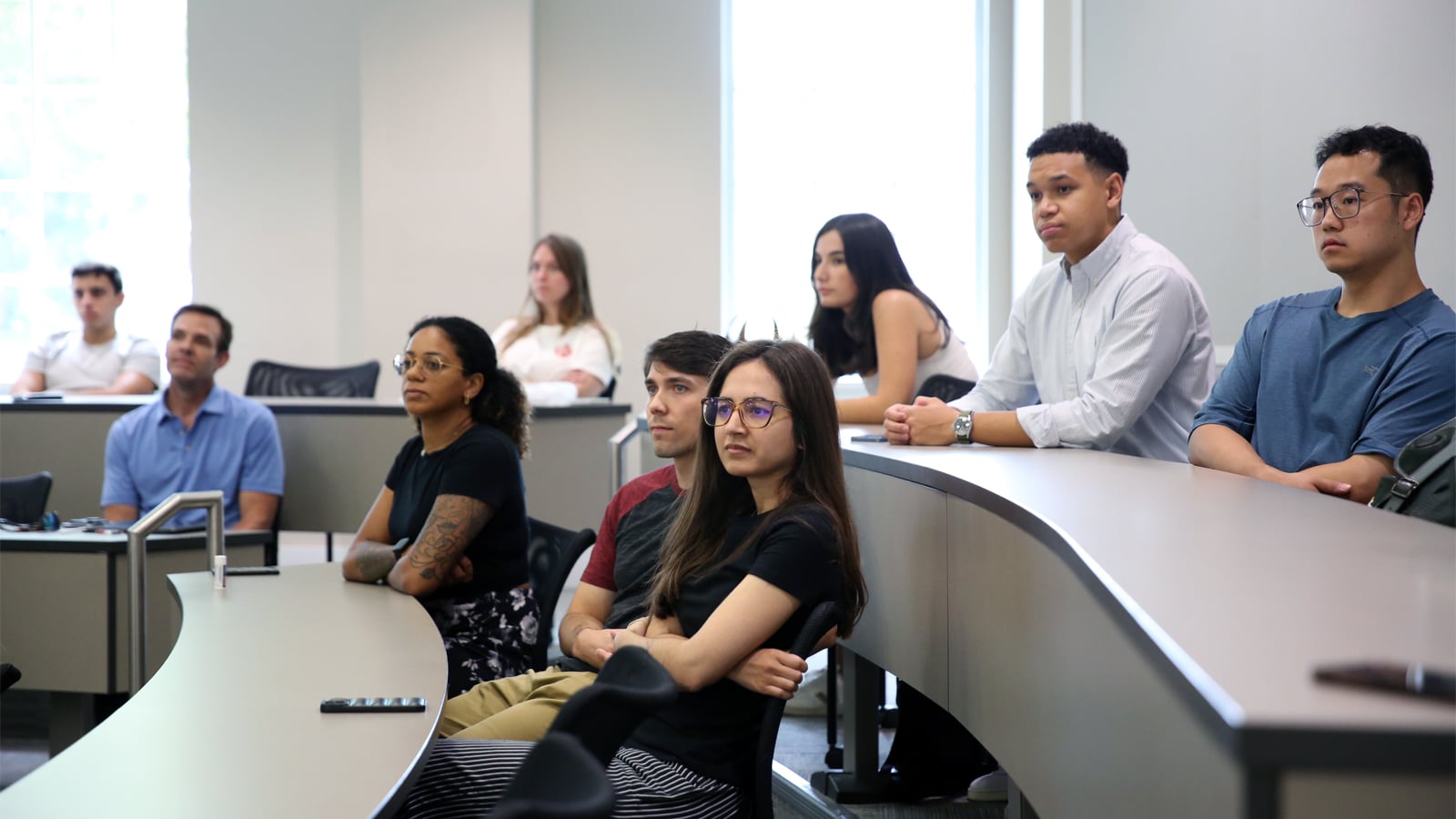 Students listening in a classroom. 