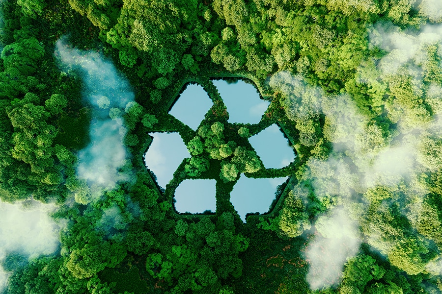 A lake in the shape of a recycling sign.