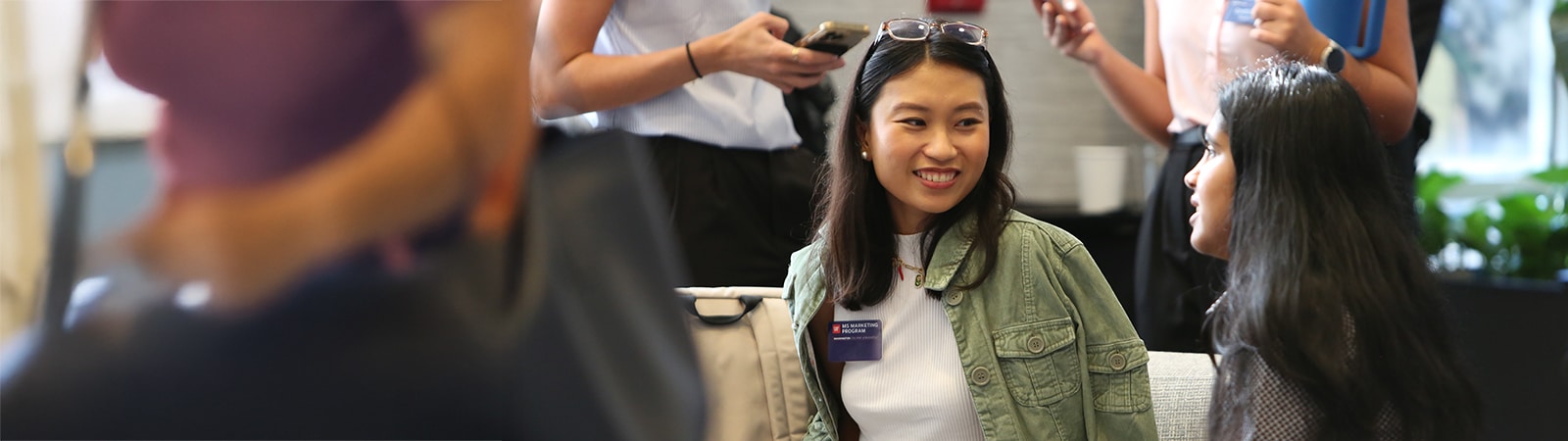 Graduate students networking at orientation.