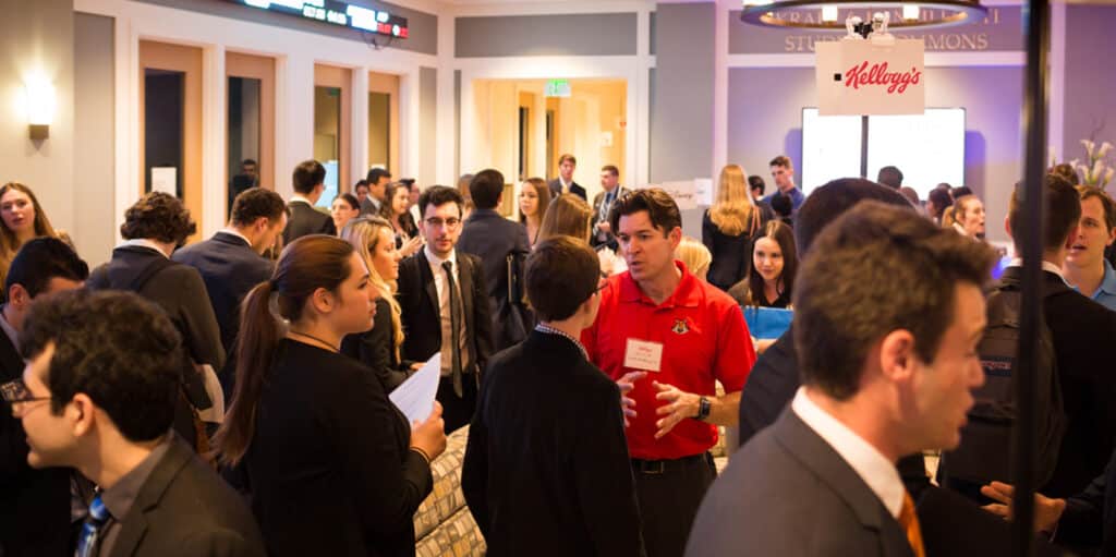 UF Warrington students, including from the Online BABA program, network with recruiters at an on-campus career fair