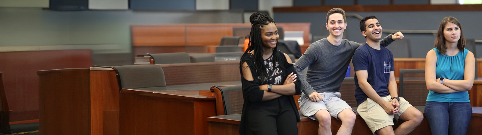 Candid happy students in a UF classroom.