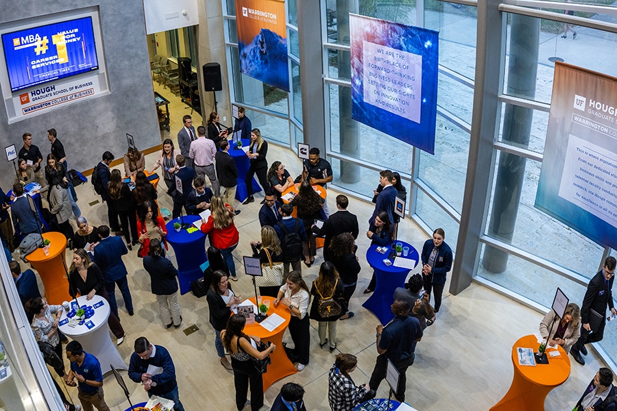 A large crowd of students networking in Hough Hall.