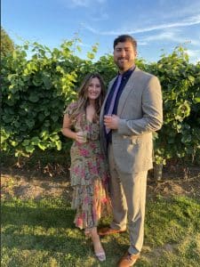 Bryan Doyle stands with is arm around his fiancé, Valerie