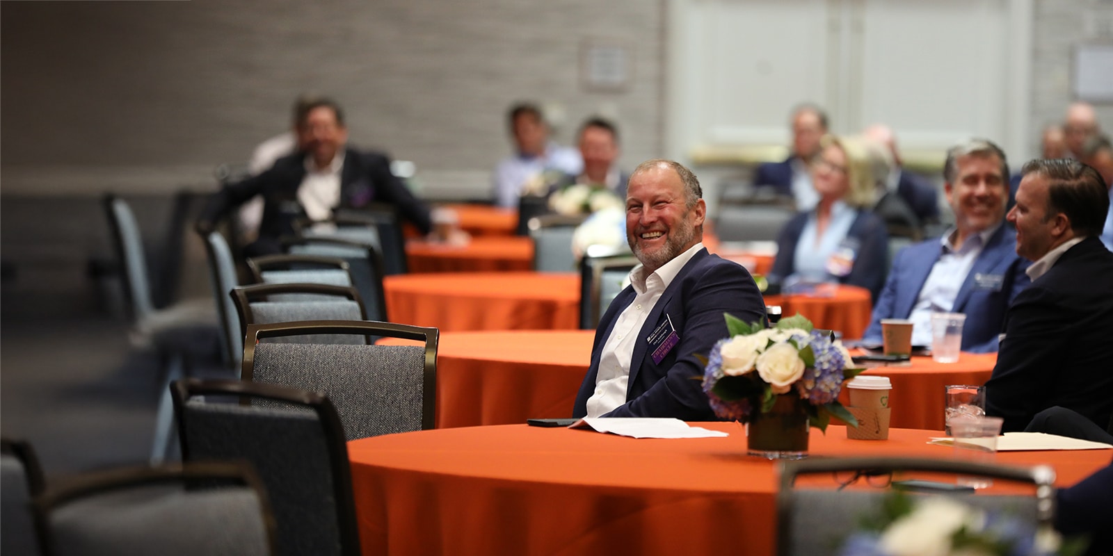 Dirk Aulabaugh, chairman's circle member, smiling at the Bergstrom Center Advisory Board retreat. 
