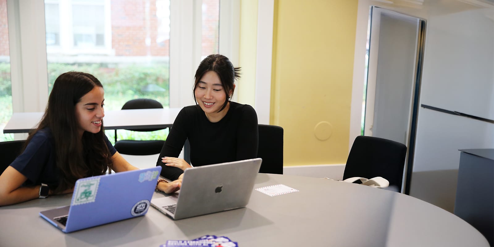 A CAP mentor coaching a student.