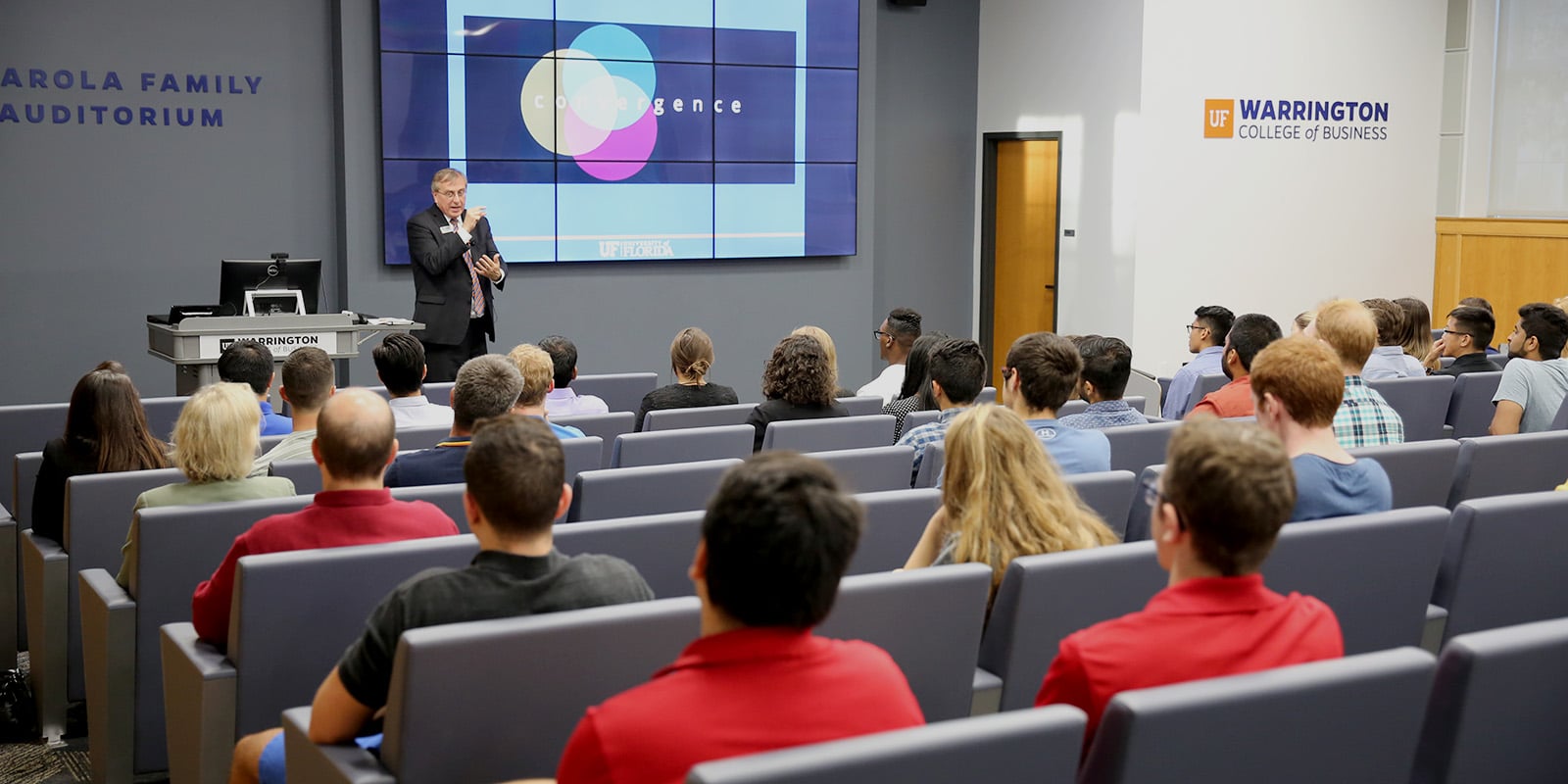 University of Florida President Fuchs presenting to a classroom of PhD ISOM students.