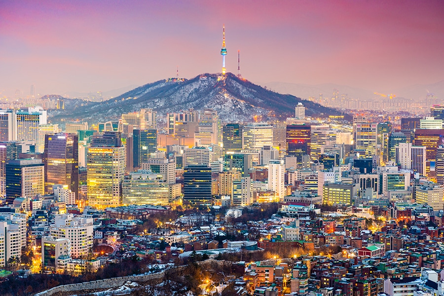 Seoul, South Korea downtown cityscape from above at dusk.