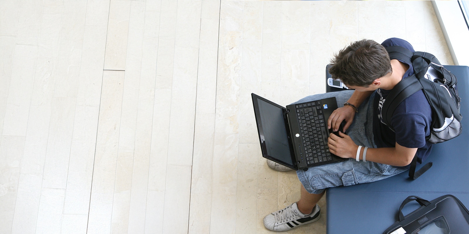 student working on a laptop in Hough Hall