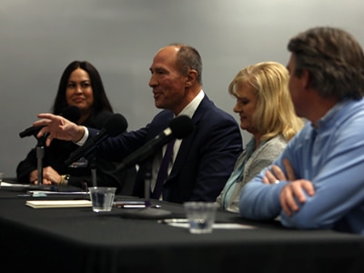 Industry leaders talking to wealth management track students.