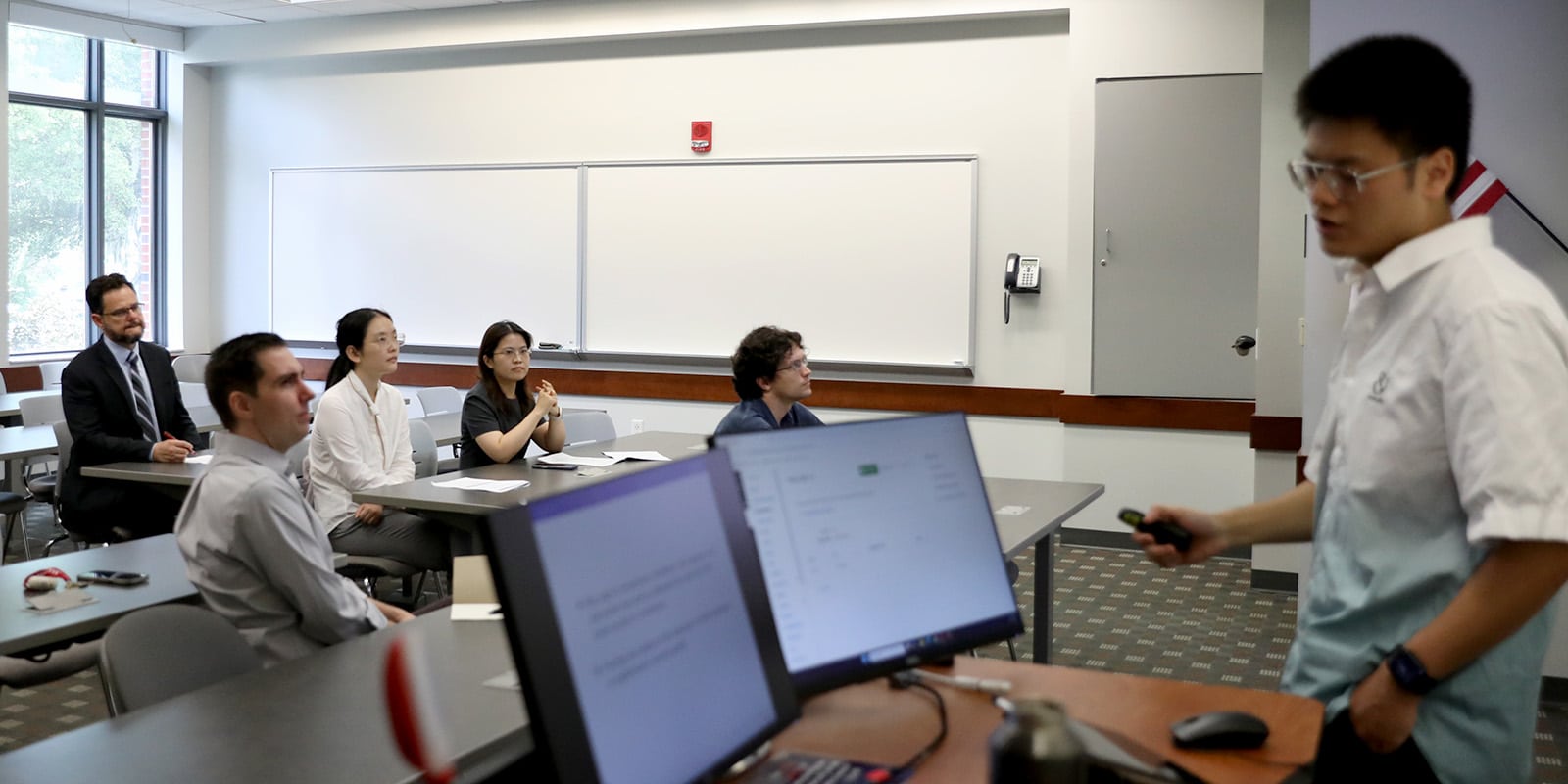 PhD students in class.