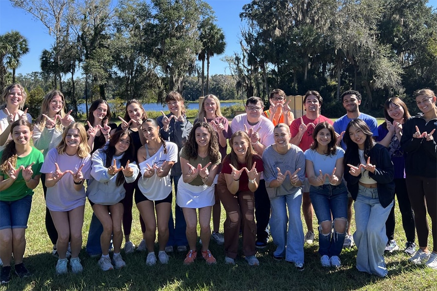 Group of students in Warrington Welcome.