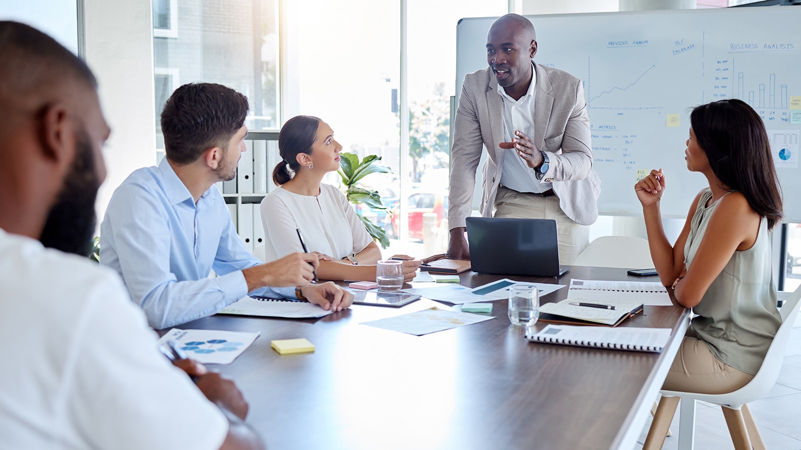 A speaker giving a business presentation. 