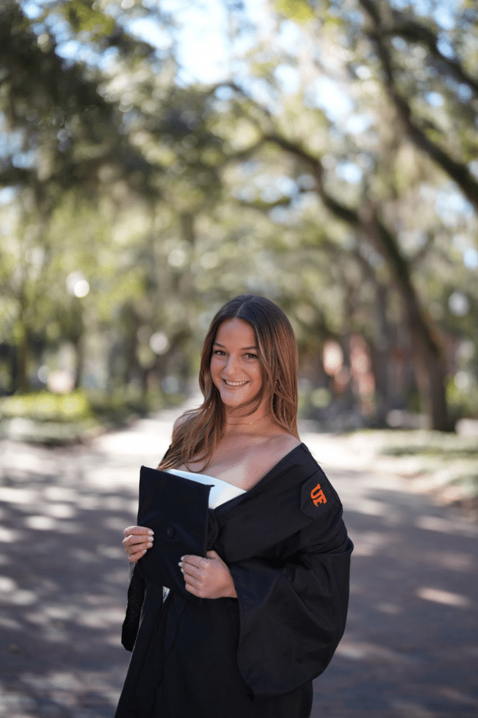 grace field graduation photo with cap and gown