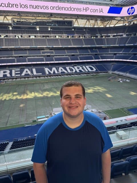 matthew worly standing in real madrid stadium