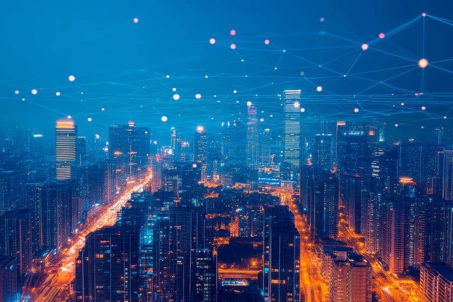 An illustration of a city with many tall buildings and time-lapsed headlights and taillights on the streets. There are glowing dots at intersecting lines overlaid in the sky.