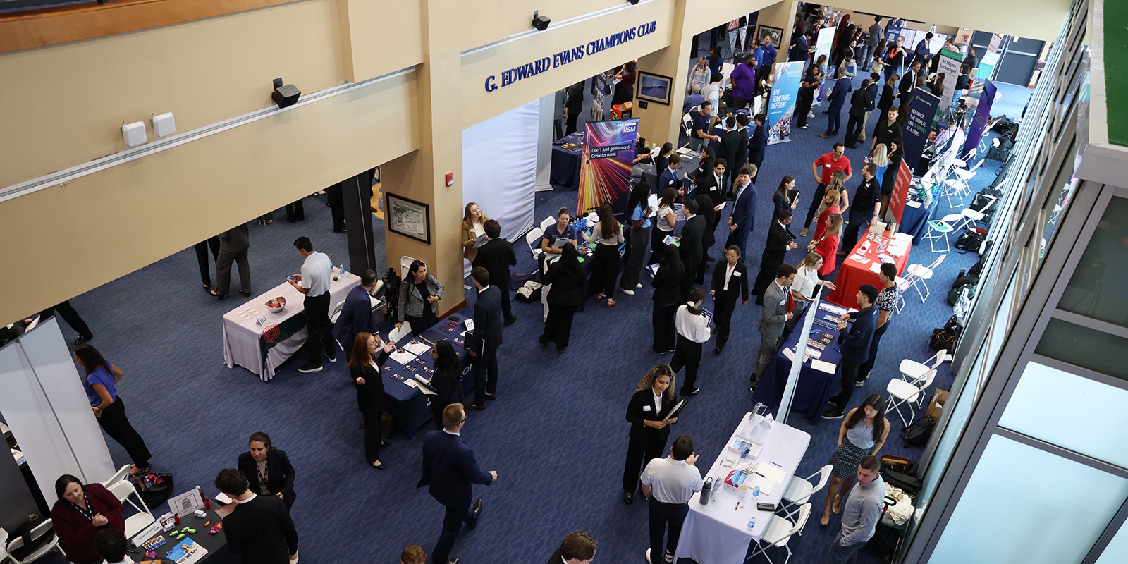 Crowd of students and employers at the Warrington Career Expo event. 