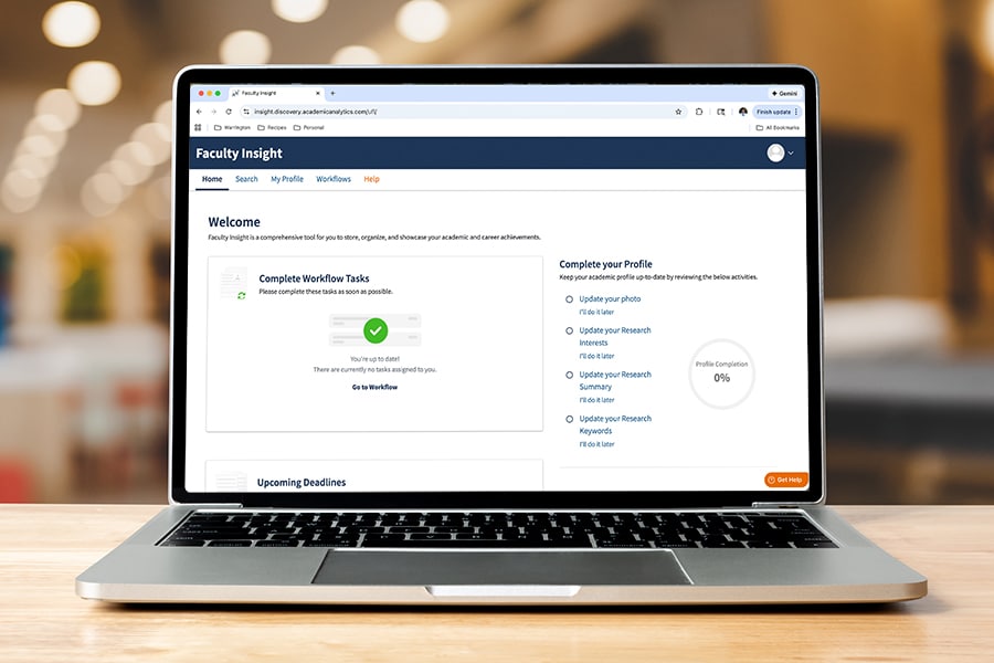 Laptop displaying the faculty insights page.