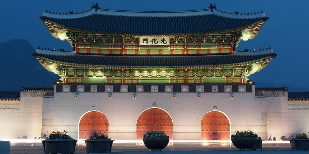 The Gwanghwamun Gate at night in Seoul, South Korea.