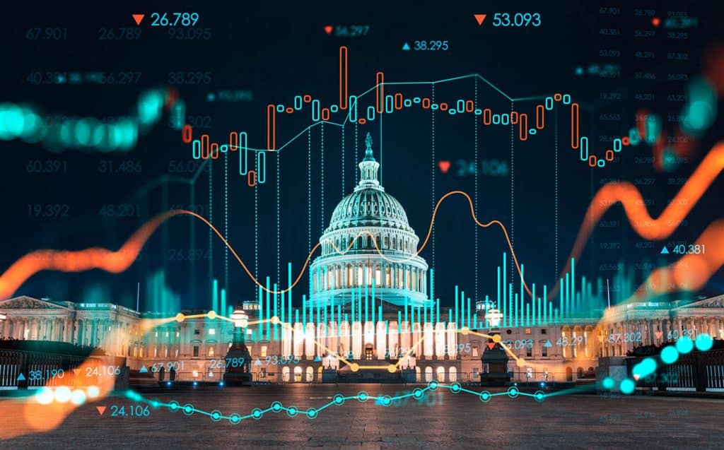 The U.S. Capitol building at night with chart lines, columns and numbers overlaid on top of it
