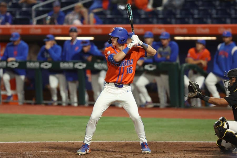Hayden Yost in a Gator baseball uniform stands ready to bat during a game.