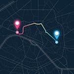 Two markers on a city map connected by a line following a street