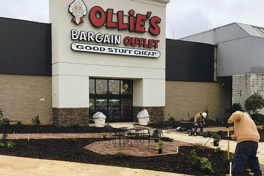 Landscaping crew works outside of Ollie's Bargain Outlet at Marshall Place