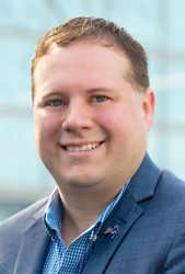 Alan Thompson headshot; smiling