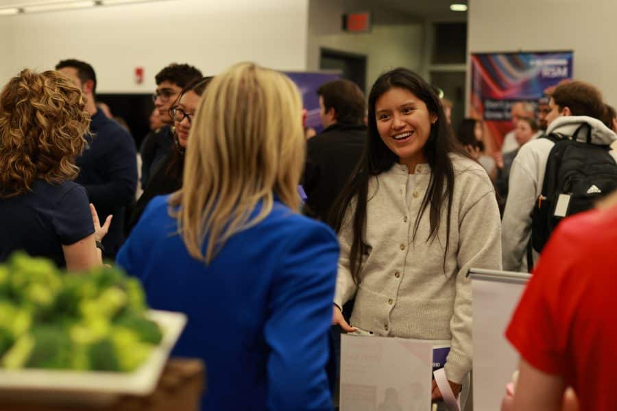 student and recruiter talking